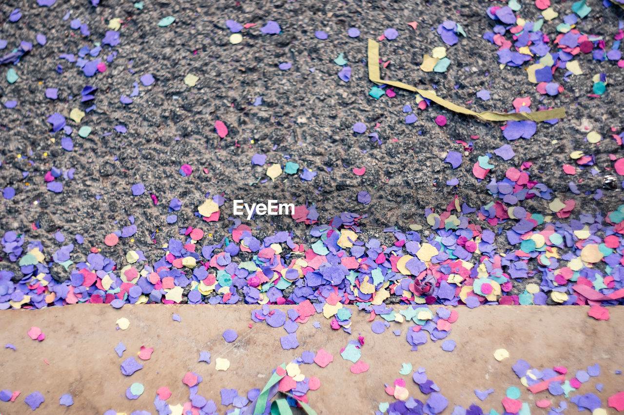 High angle view of multi colored carnival confetti