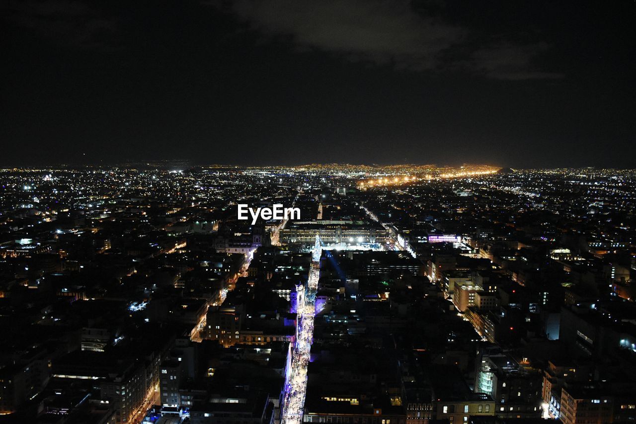 Scenic view of illuminated cityscape at night