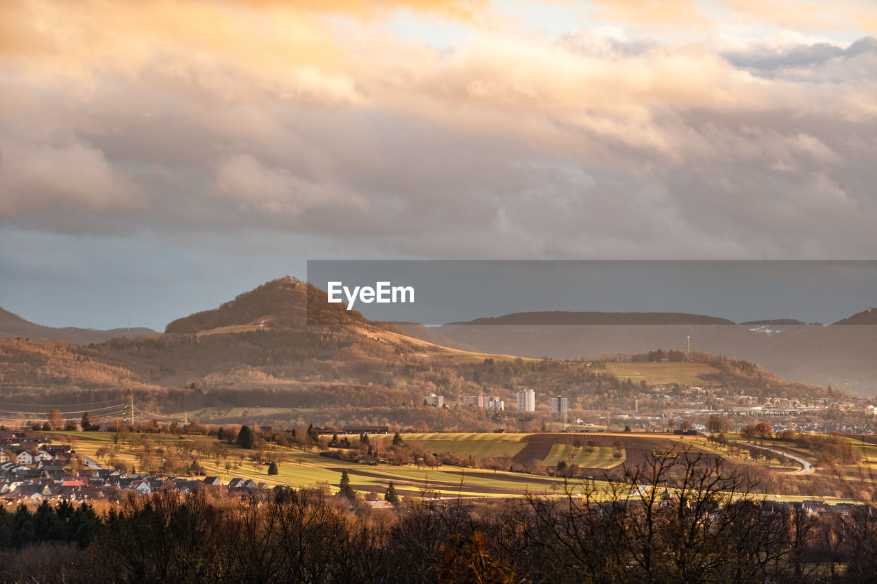 Scenic view of landscape against sky during sunset