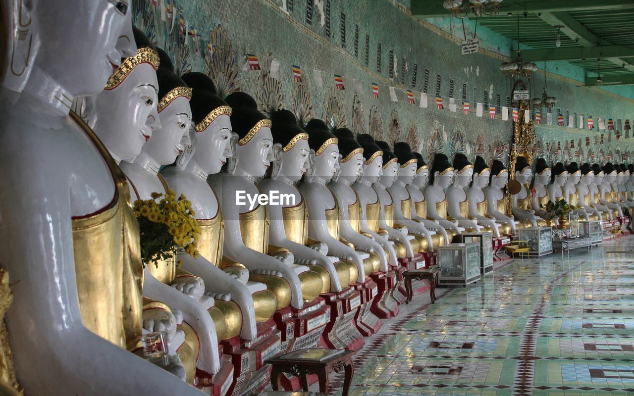 Buddha statues in row at temple