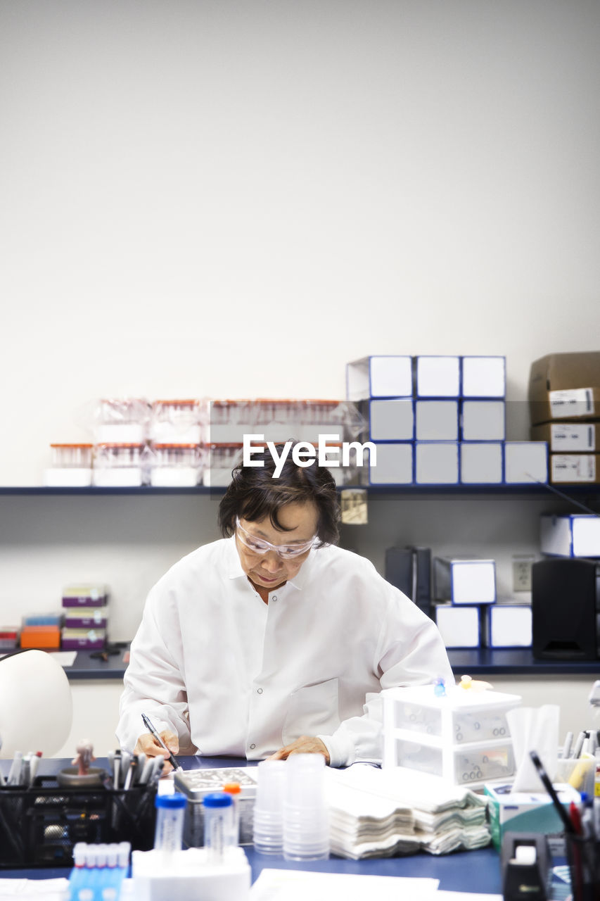 Senior female scientist working in laboratory