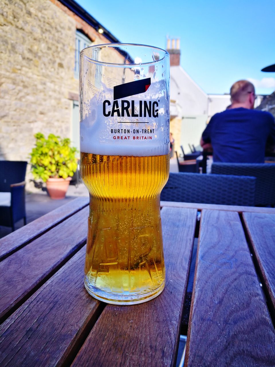 BEER GLASS ON TABLE