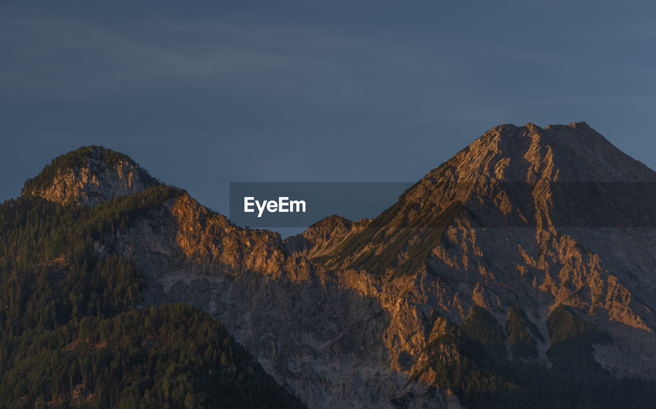 SCENIC VIEW OF MOUNTAIN AGAINST SKY