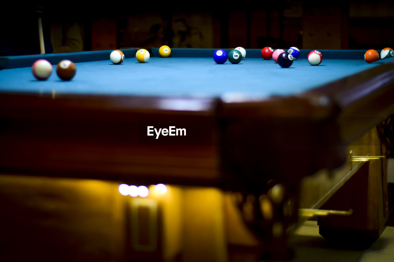 Colorful pool balls on table