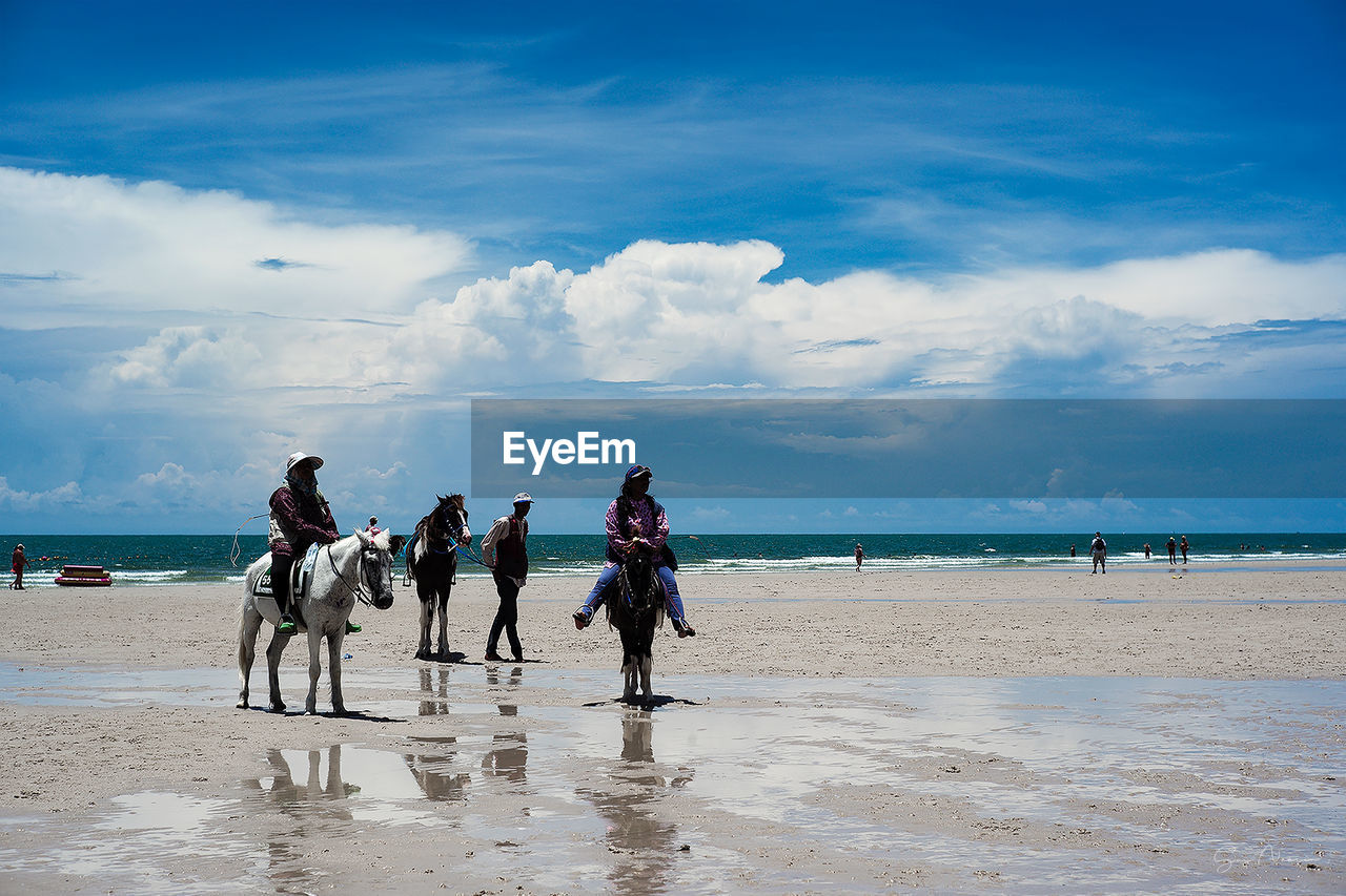 PEOPLE ON BEACH