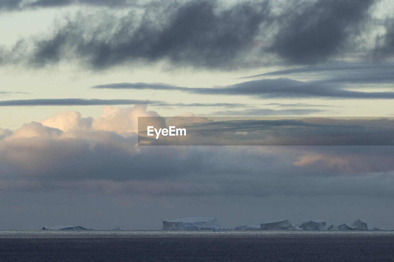 SCENIC VIEW OF CLOUDS OVER SEA