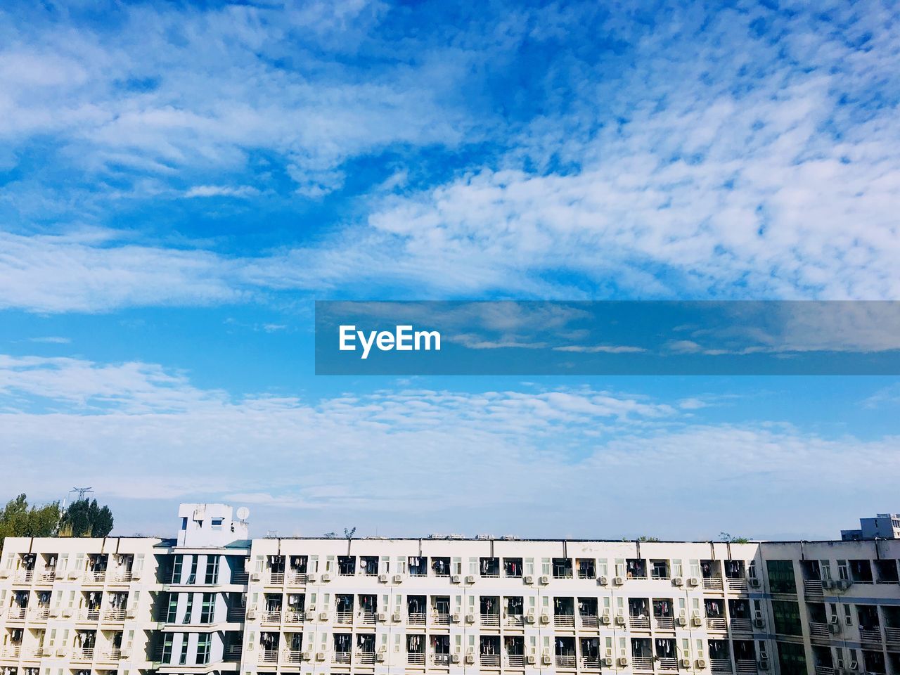 White buildings against blue sky during sunny day