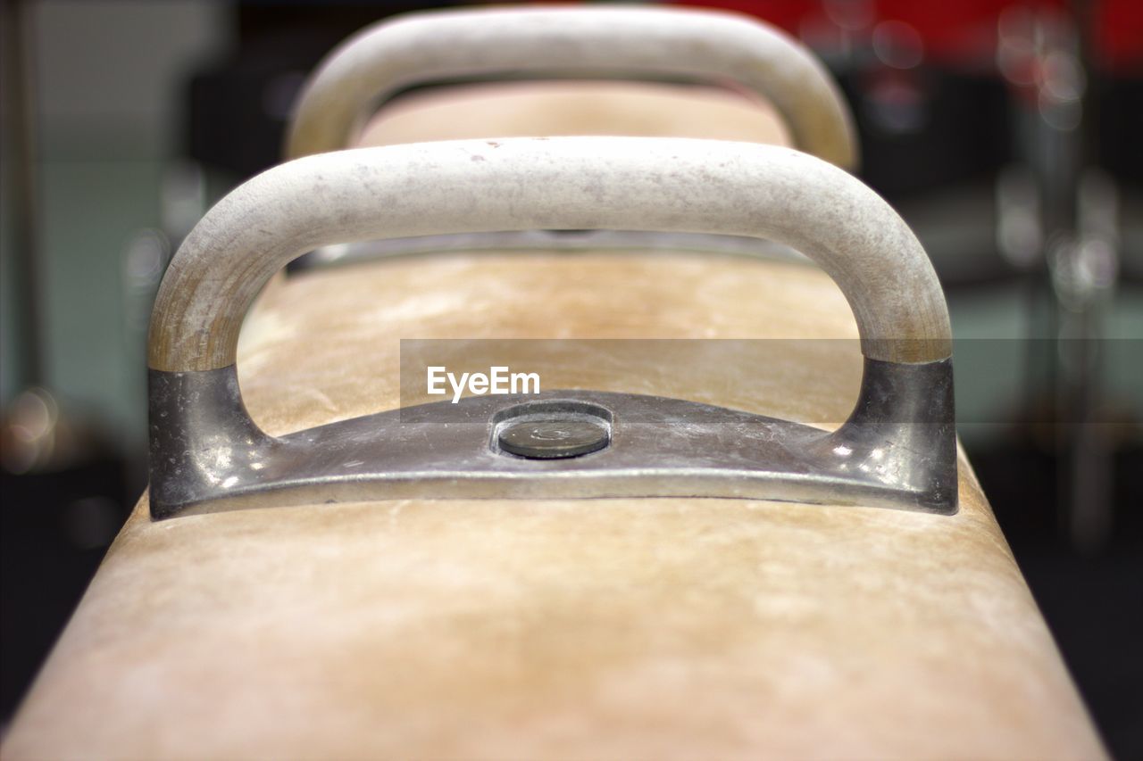 Close-up of pommel horse at gym