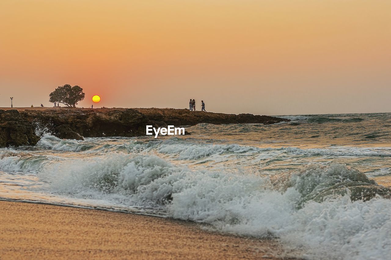 Scenic view of sea during sunset