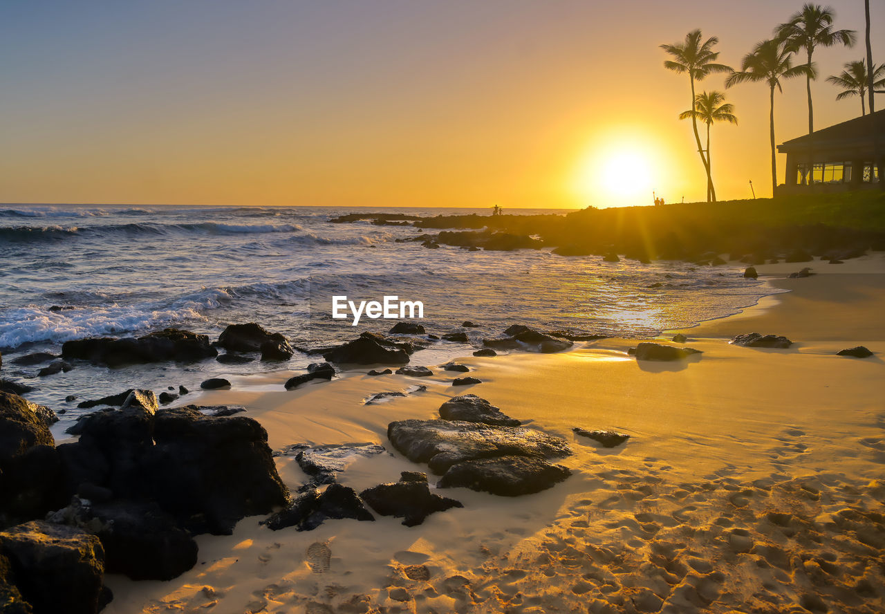 Scenic view of sea against sky during sunset