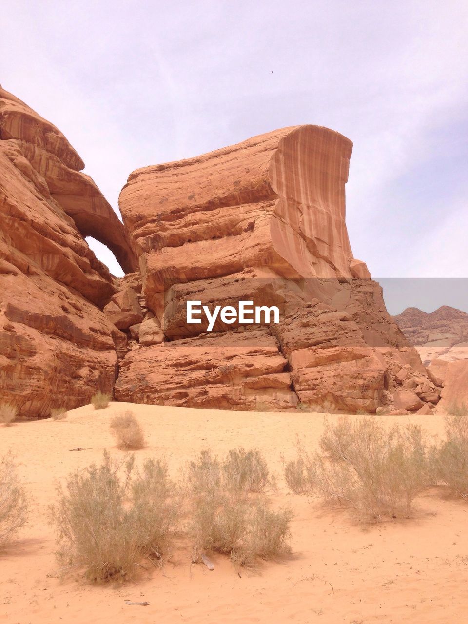 Rock formation in desert against sky