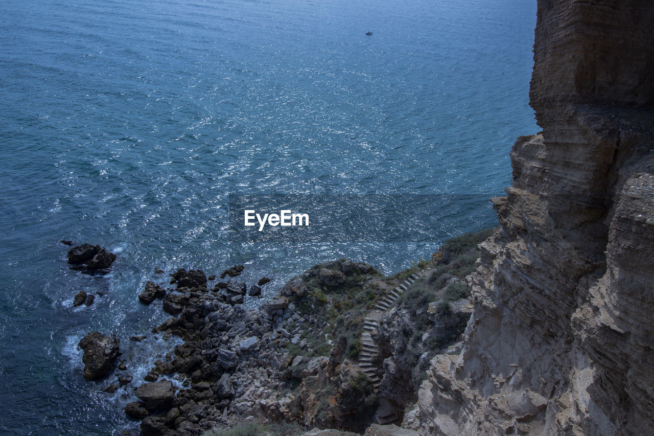 High angle view of rocks on beach