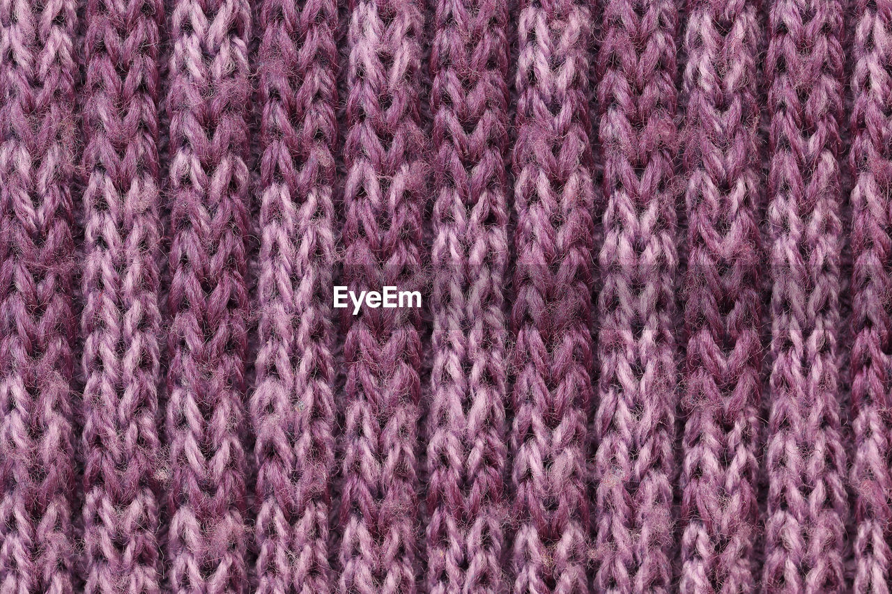 Full frame shot of purple knitted fabric