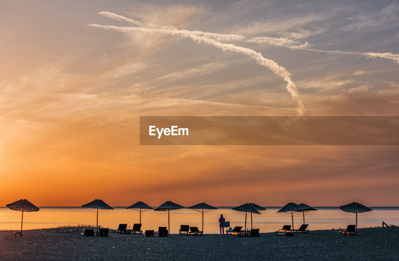 Scenic view of sea against sky at sunset