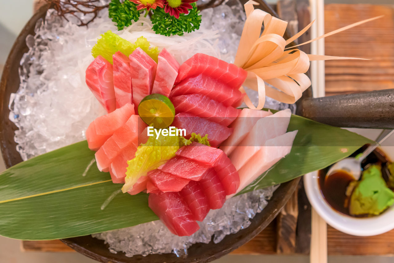 Salmon raw sashimi sushi on plate, japanese food.
