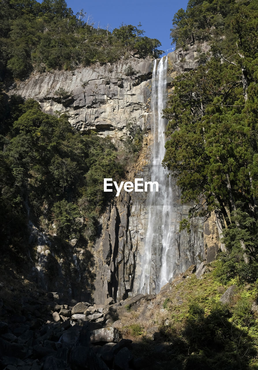 Nachi waterfall near kii-katsuura in japan on a sunny day with rainbow