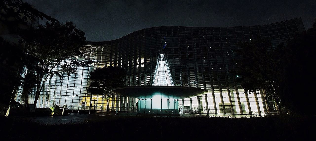 Illuminated national art center during night