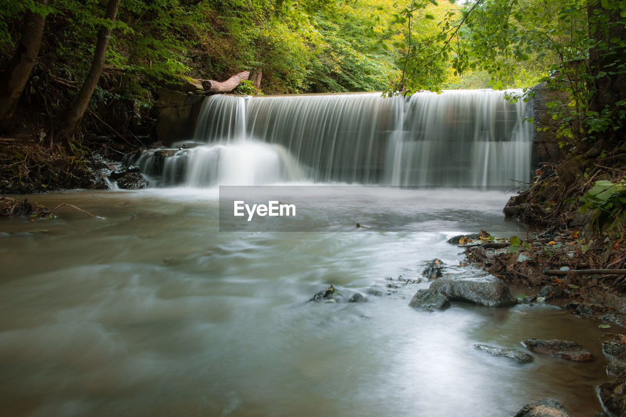 High angle view of waterfall in forest