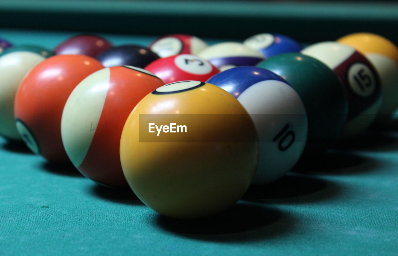 Close-up of multi colored ball on pool table