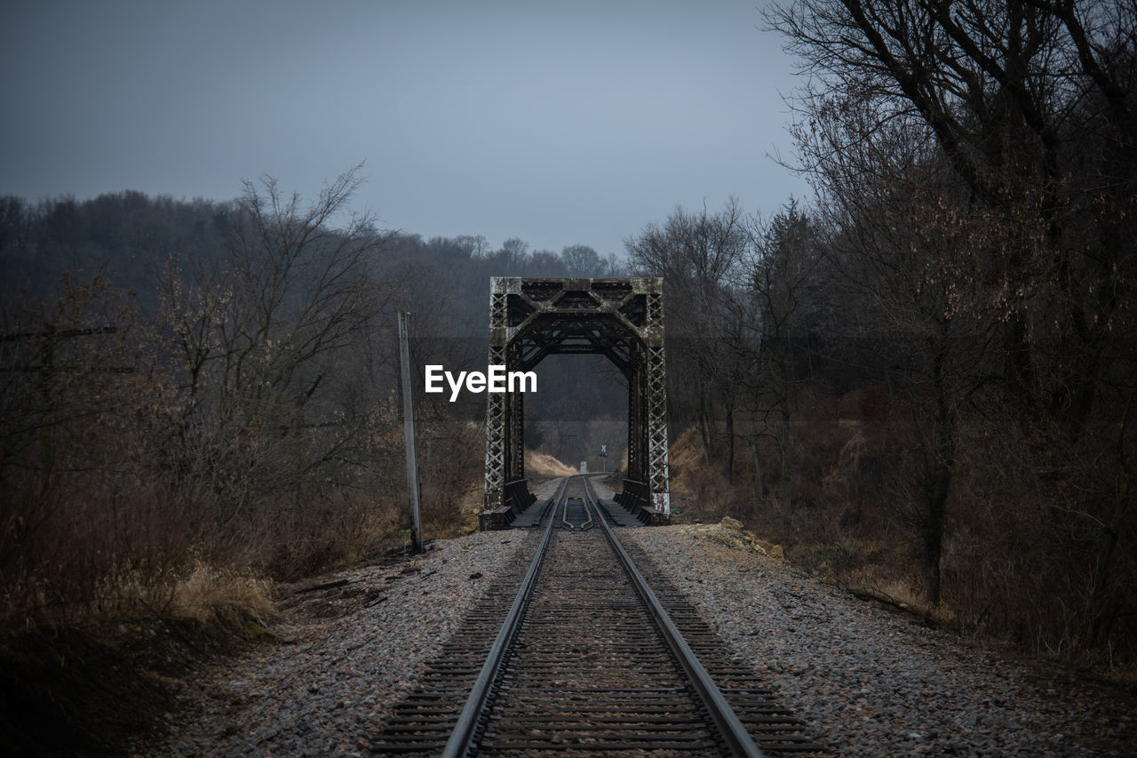 VIEW OF RAILROAD TRACKS ALONG PLANTS