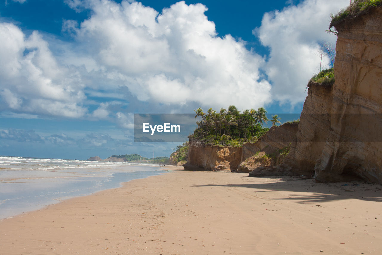 Scenic view of beach against sky