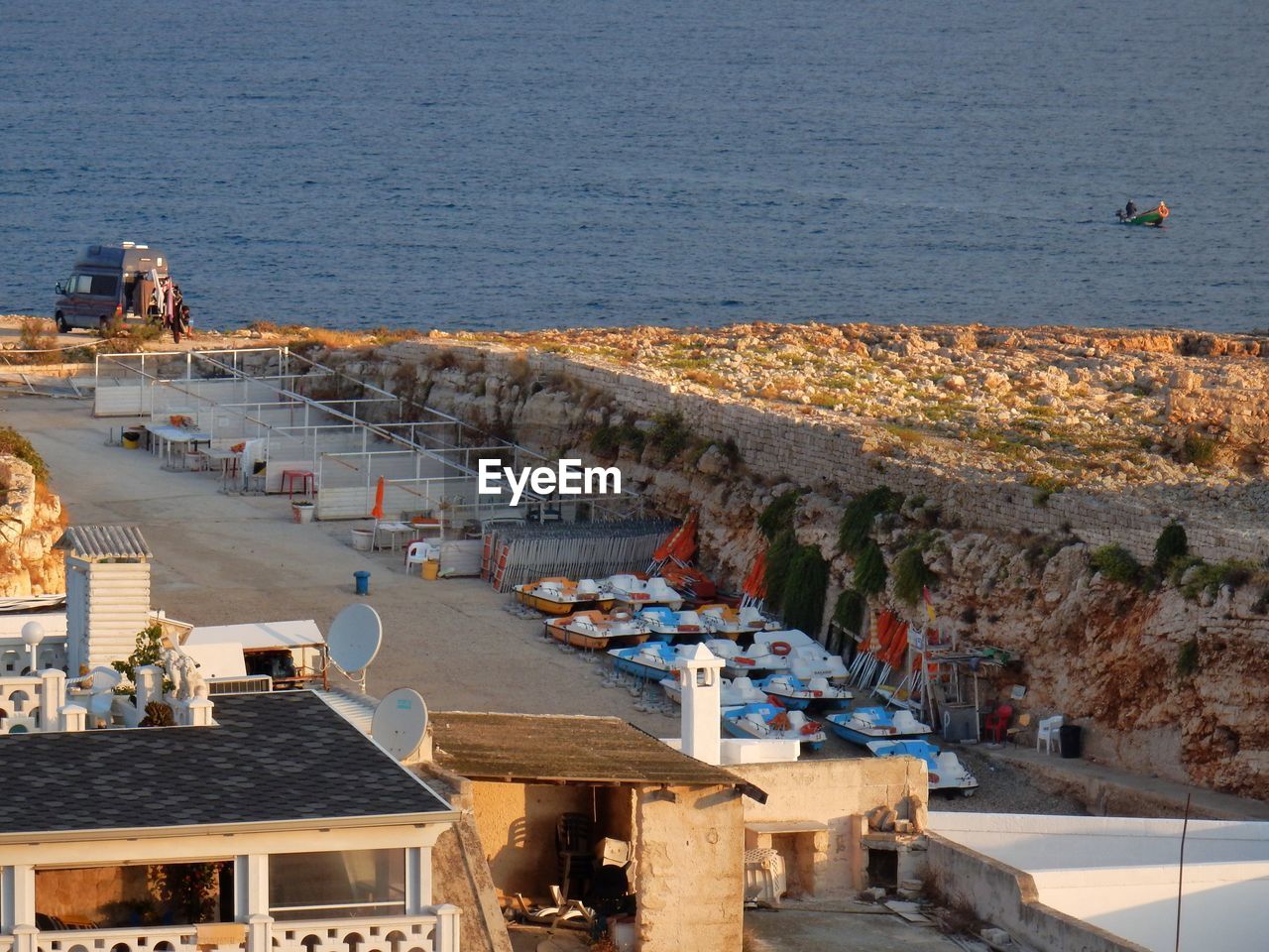 HIGH ANGLE VIEW OF BUILDINGS AND SEA