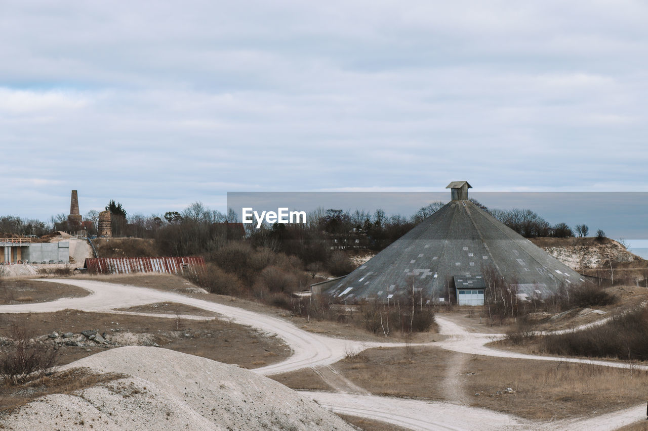 cloud, sky, architecture, nature, sand, built structure, snow, no people, winter, day, building exterior, land, monument, outdoors, landscape, environment, history, building, travel destinations, the past