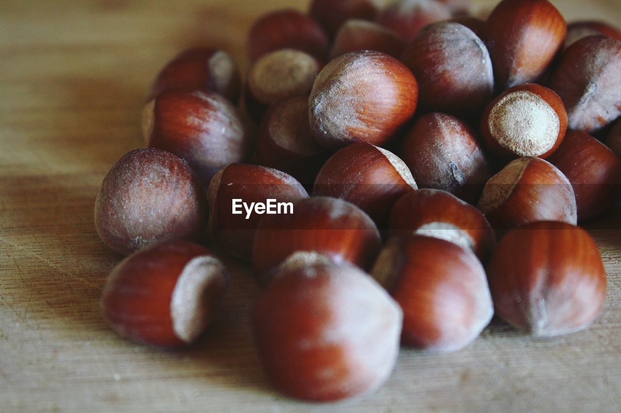 Close-up of chestnuts on table
