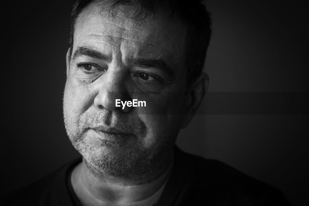 Mature man close-up face. black and white portrait