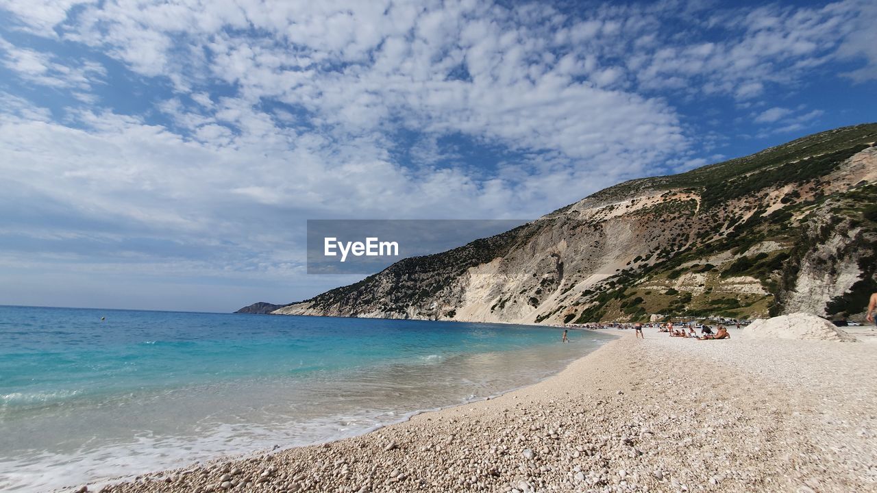 PANORAMIC VIEW OF BEACH AGAINST SKY