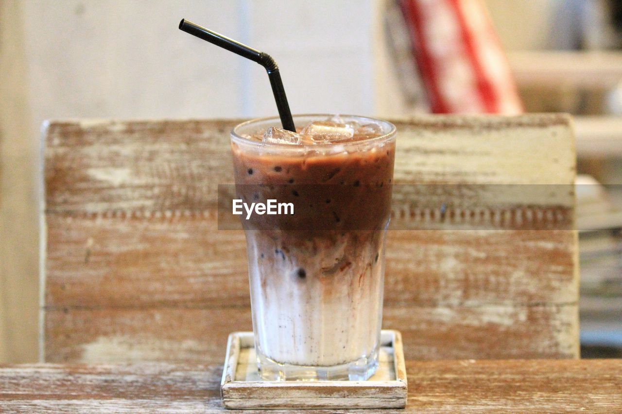 Close-up of iced coffee on table
