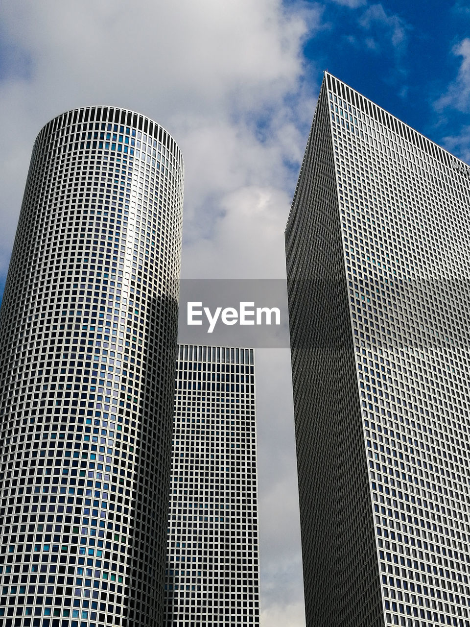 Low angle view of modern buildings against sky