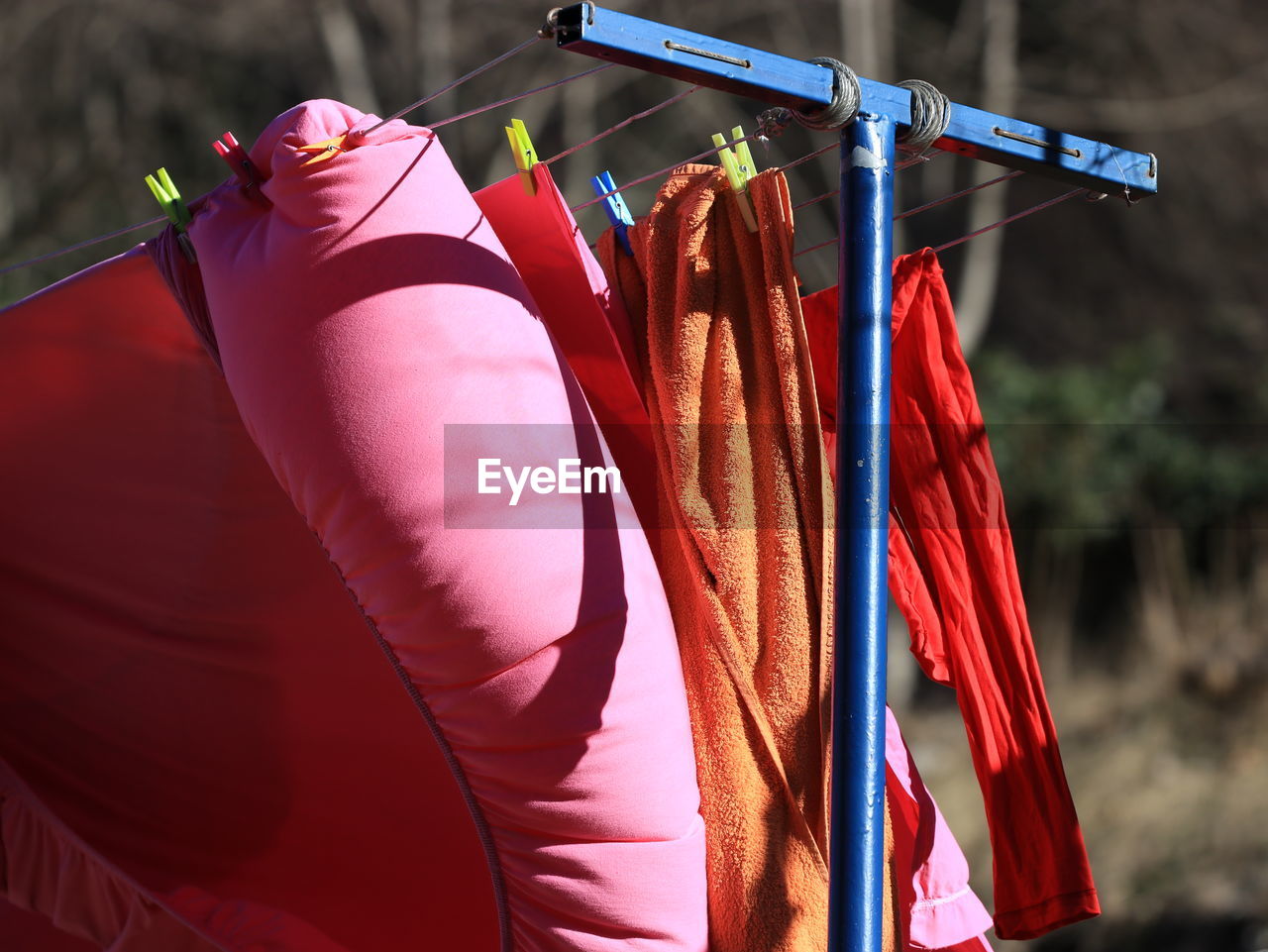 Close-up of multi colored clothes hanging outdoors