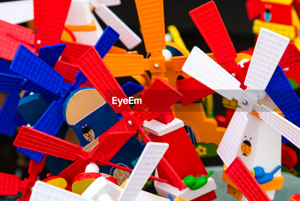 Full frame shot of multi colored toy windmills