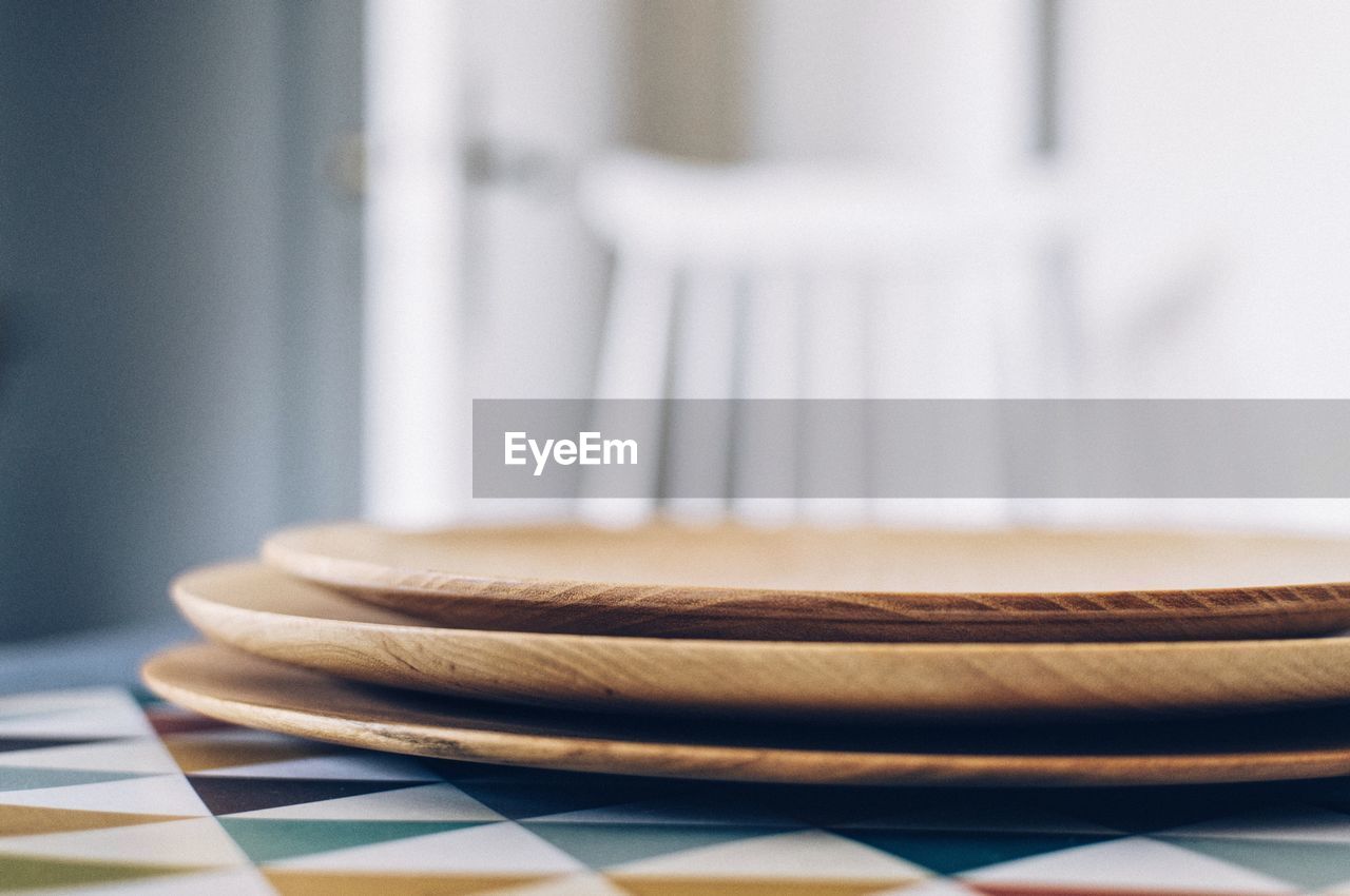 Extreme close up of plates on table