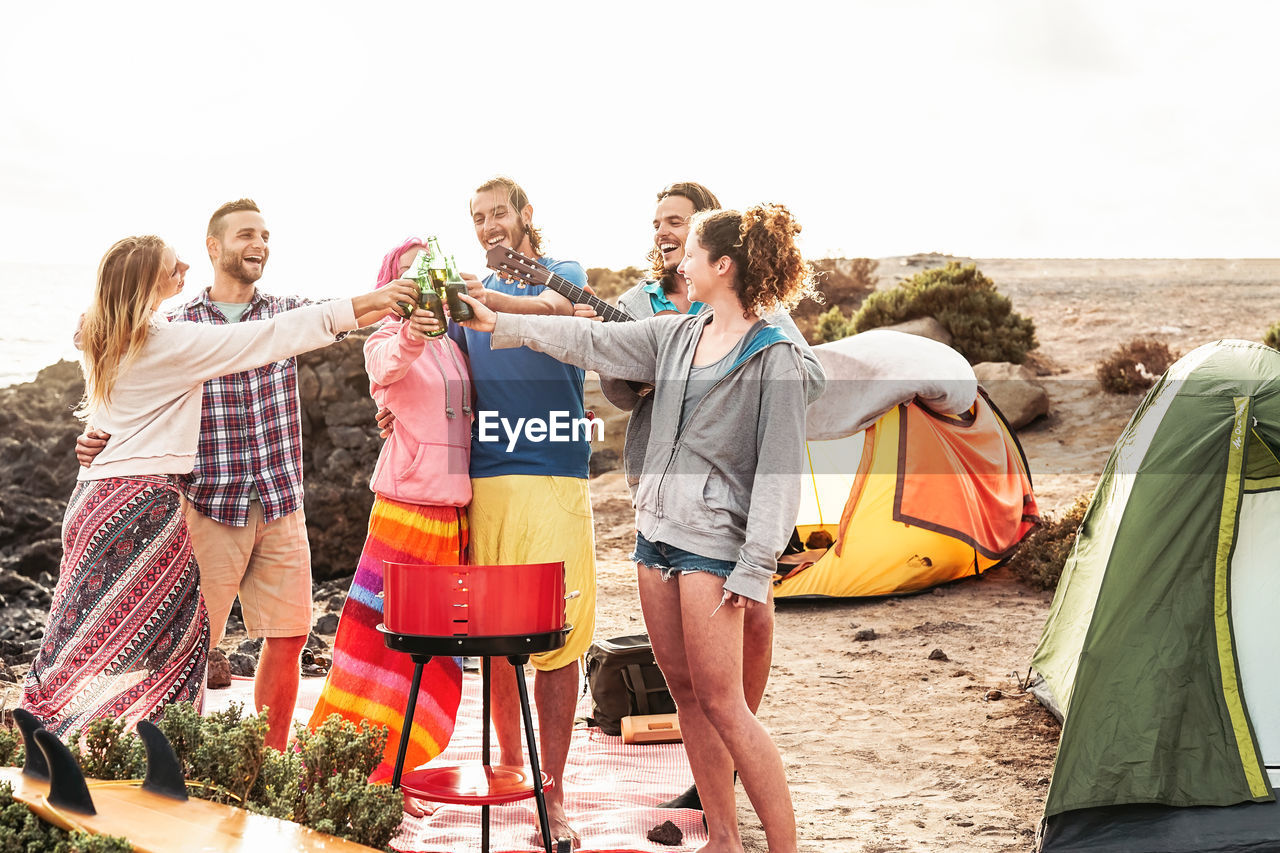 GROUP OF PEOPLE ON BEACH