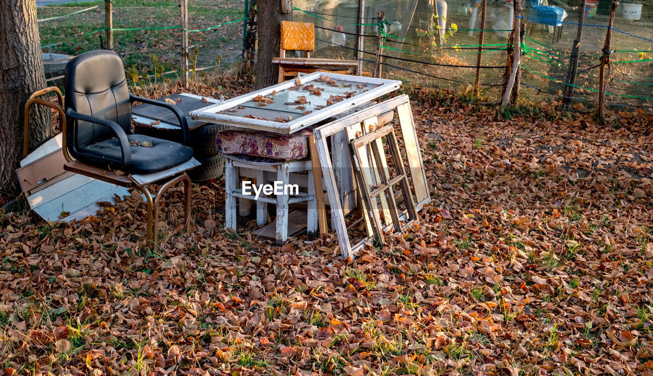 A table and chair made of scraps in the garden
