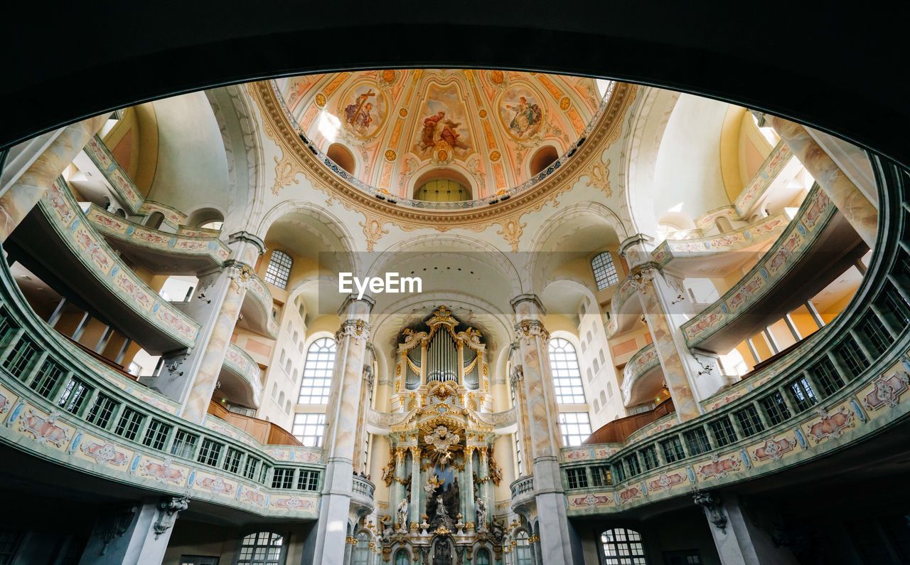 Hugh organ in the middle of a colorful church