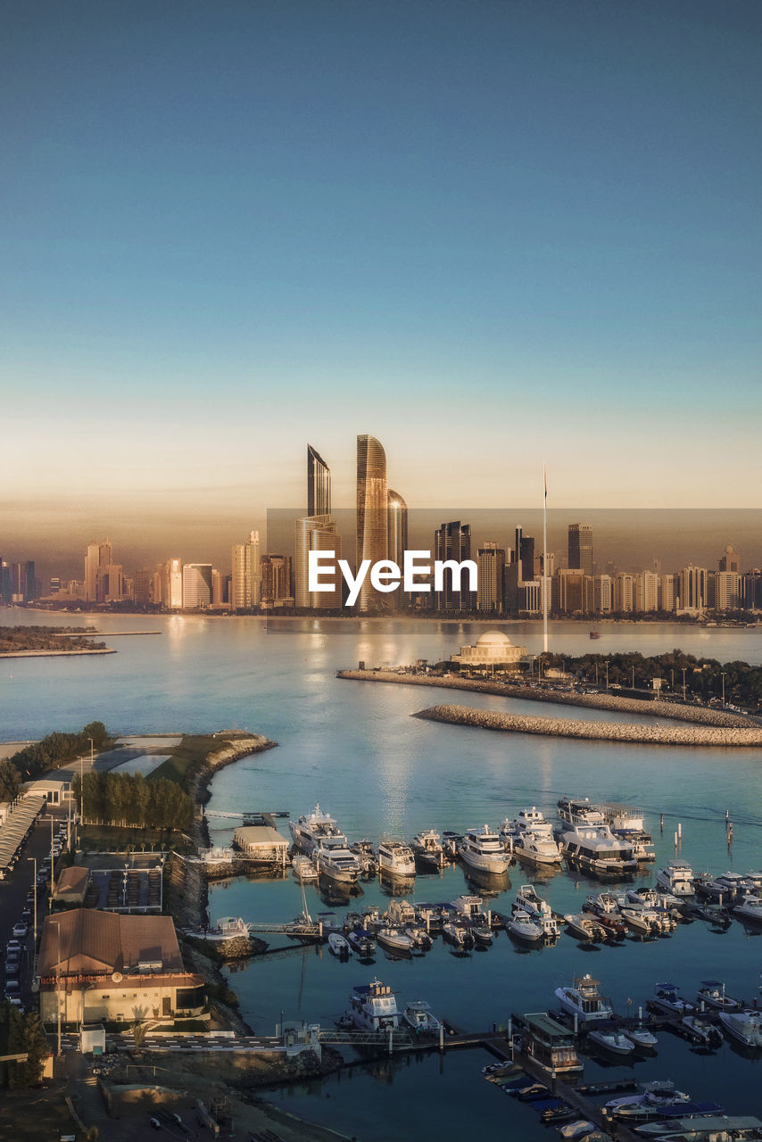 View of city buildings against sky in abu dhabi, uae