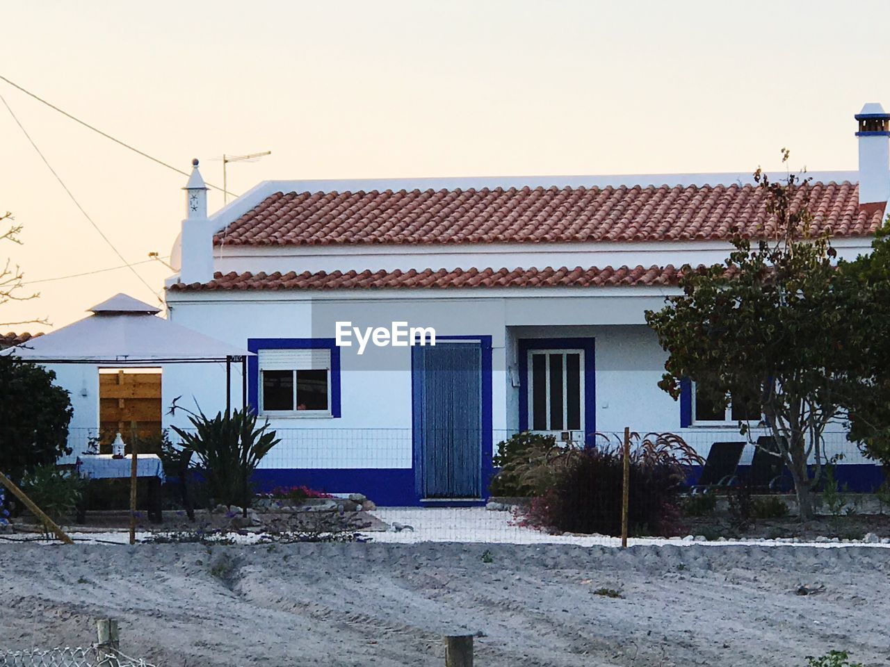 HOUSES AGAINST SKY