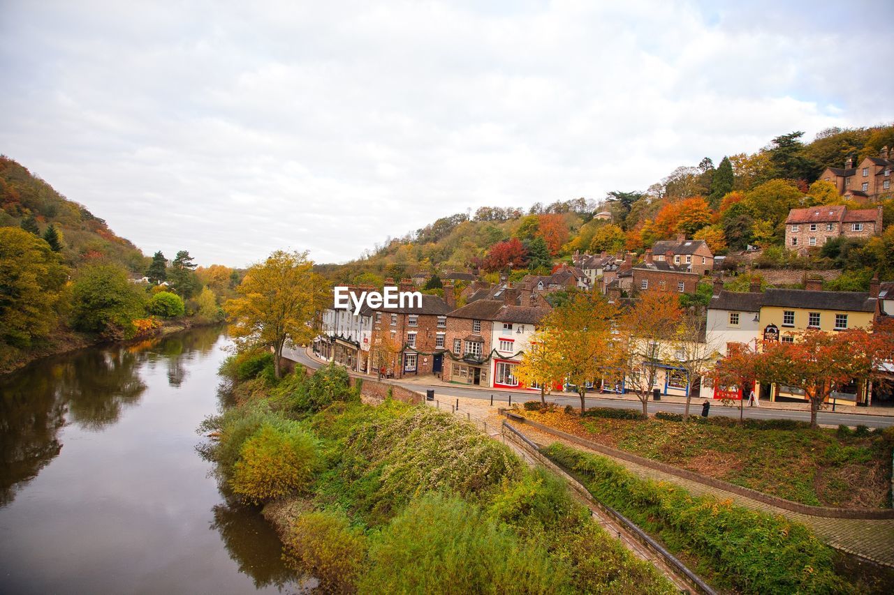 Scenic view of trees during autumn against sky