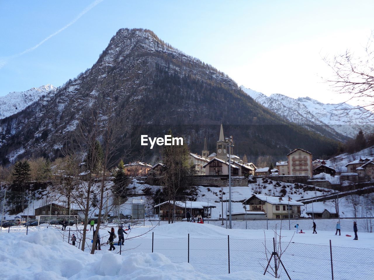 Scenic view of snow covered mountains against sky