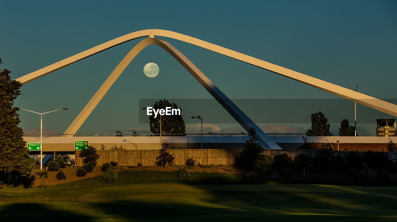 GOLF COURSE AGAINST CLEAR SKY