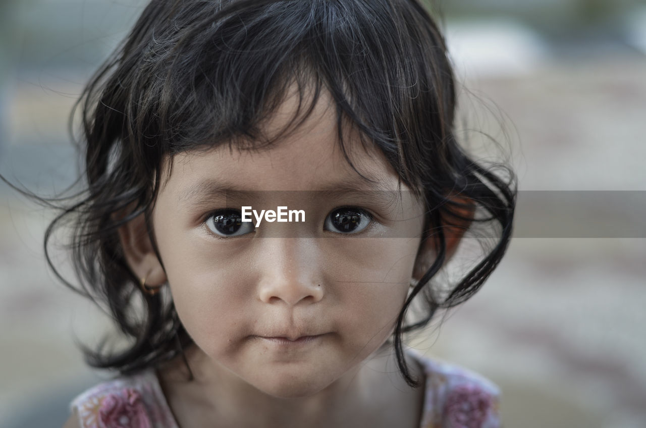 Close-up portrait of cute girl