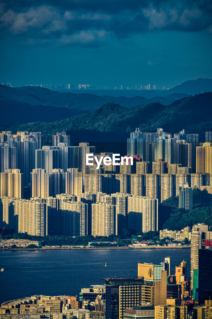 Aerial view of cityscape against sky