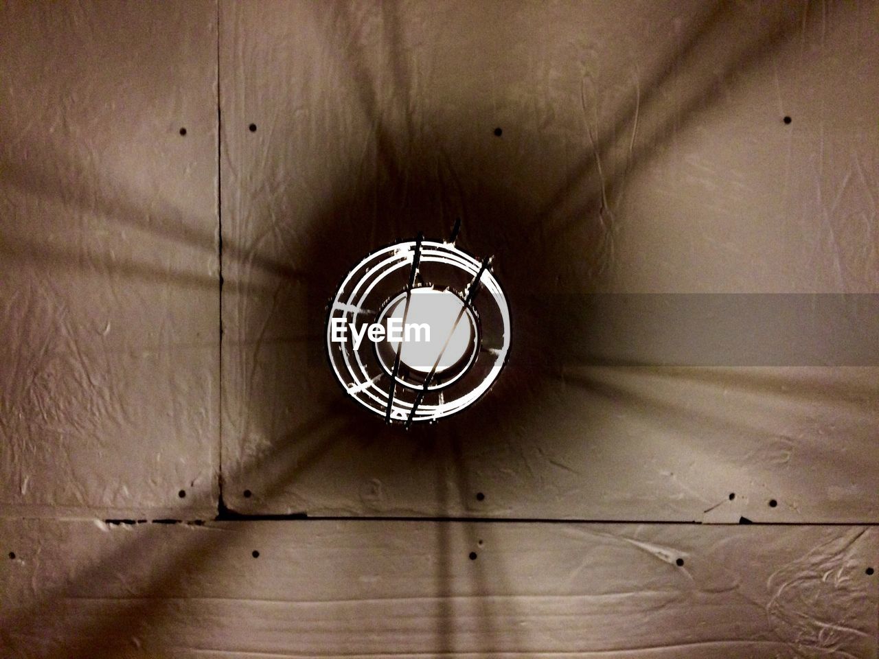 LOW ANGLE VIEW OF ILLUMINATED LIGHT BULB