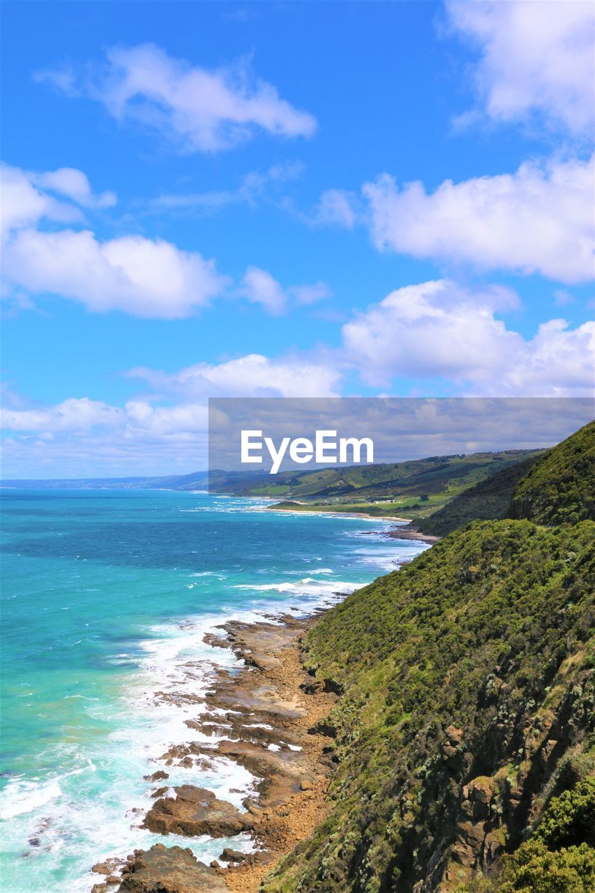 Scenic view of sea against blue sky