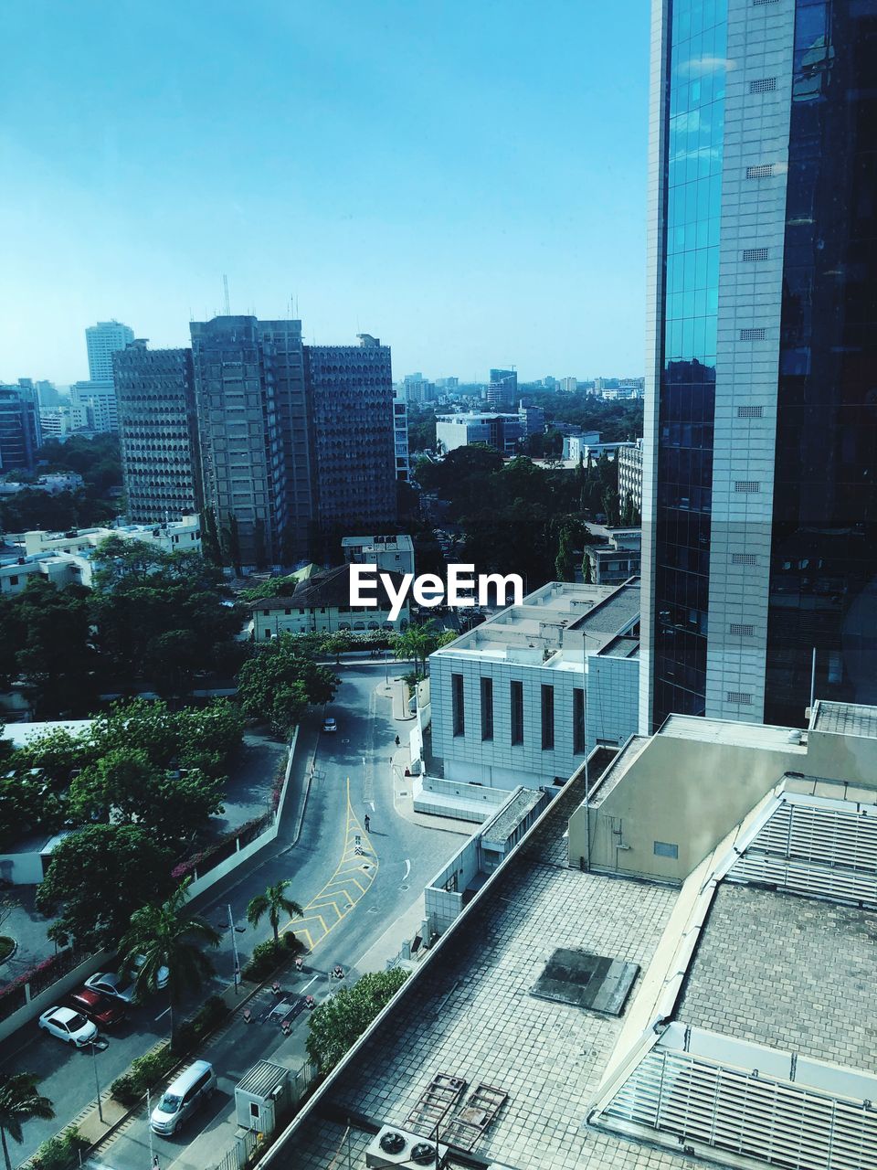 HIGH ANGLE VIEW OF CITY BUILDINGS AGAINST SKY