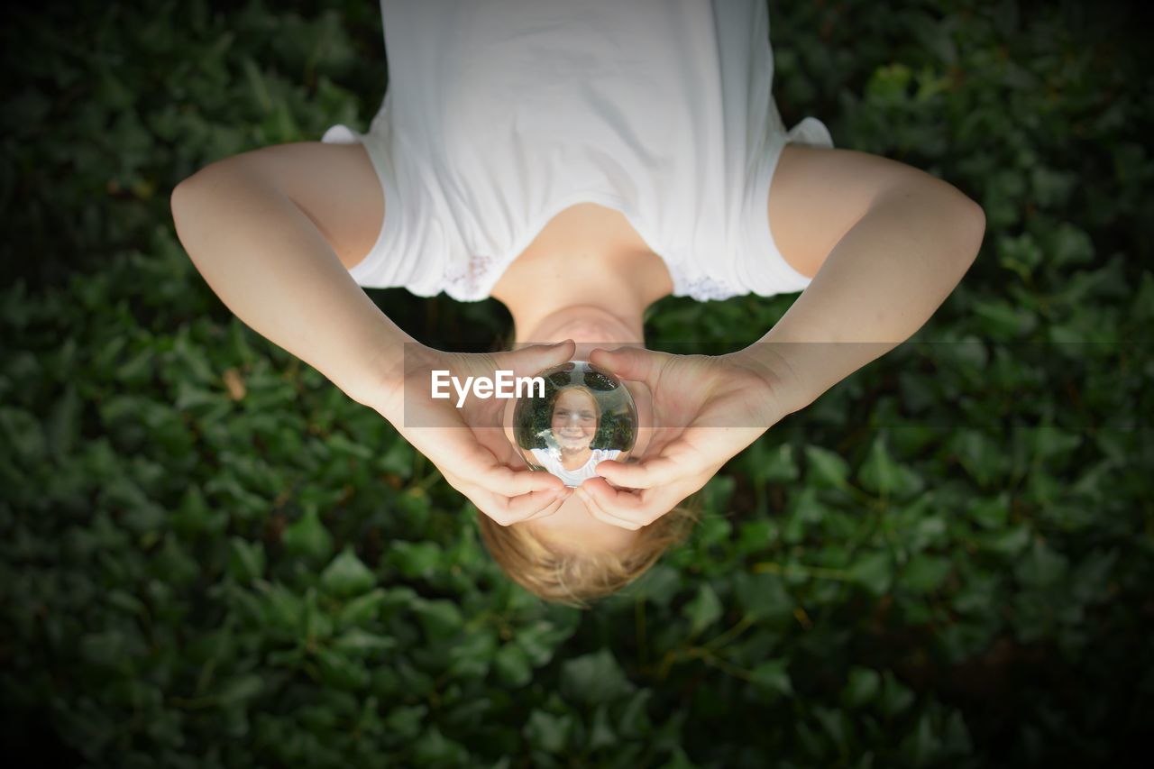 Close-up of girl hanging 