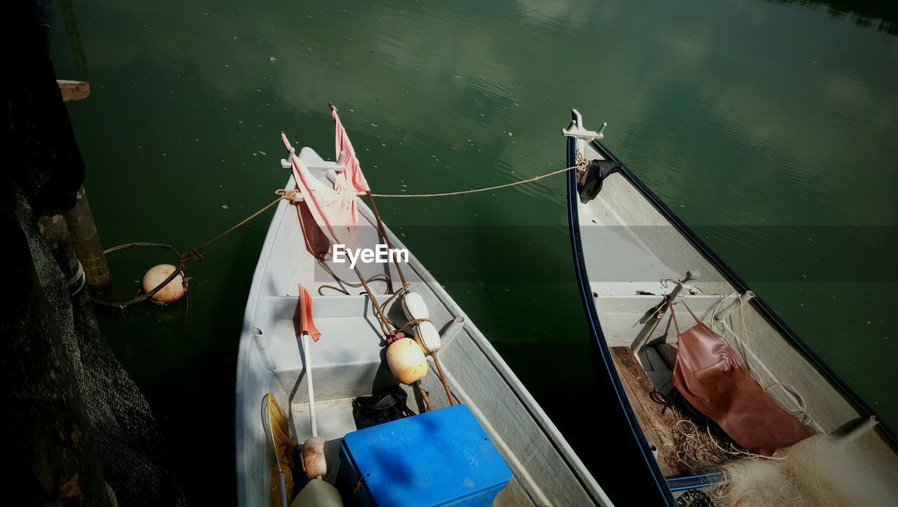 High angle view of fishing boats moored on sea